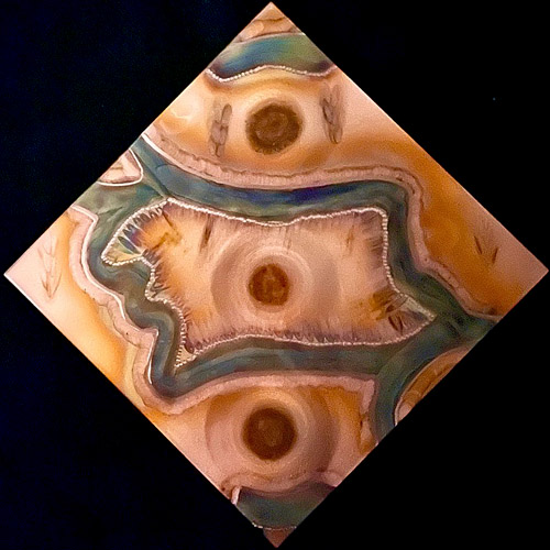 flame painting on copper with resin